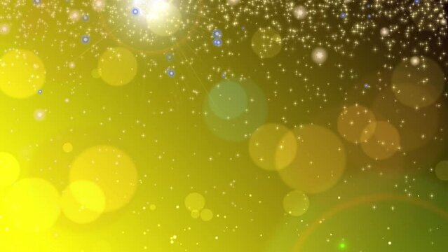 Falling star shower, bokeh spots and lens flare on gold/ yellow/ green  gradient. Abstract background suitable for a variety of concepts and themes.