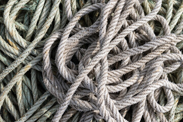 Fototapeta na wymiar Tangled Ship rope background. Full frame