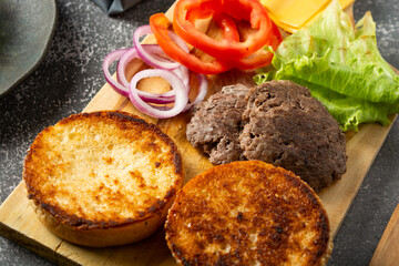 fresh ingredients ready for homemade burger assembly