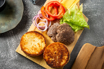 fresh ingredients ready for homemade burger assembly