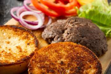fresh ingredients ready for homemade burger assembly