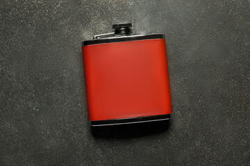 New hip flask on dark background