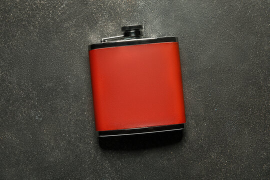 New hip flask on dark background