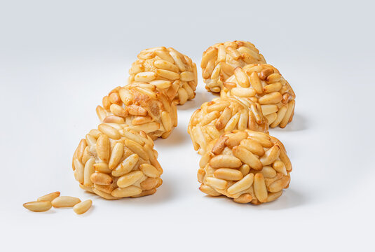 Panellets pine nuts close up. Typical Catalan dessert panellets of All Saints holiday, known as Castanyada