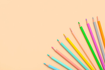 Bright pencils on color background