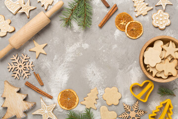 Flat lay with cute homemade Christmas cookies on concrete background,top view