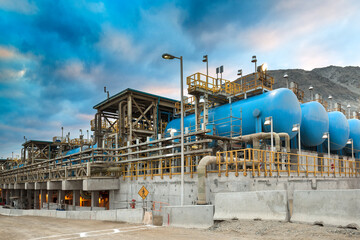 Water tanks and reverse osmosis equipment in a desalination plant.