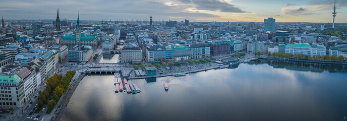 Aerial view of Alster lake, surrounded by the impressive backdrop of the iconic Hamburg skyline,...