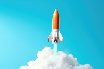 Naklejka na ściany i meble Carrot rocket on sky blue background.