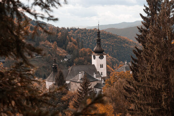 Church in the mountains, Špania Dolina, Slovakia - obrazy, fototapety, plakaty