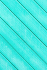 Obraz premium texture of a plastic green fence close-up. artificial turf, plastic, plastic building materials, plastic finishing materials, imitation of wooden boards painted green