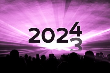 Turn of the year 2023 2024 pink laser show party. Luxury entertainment with people crowd audience silhouettes at new year celebration. Premium nightlife event at holidays season time - 664069346