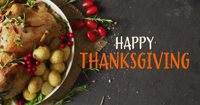 Animation of happy thanksgiving text and dinner on grey background