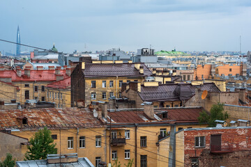 Fototapeta na wymiar top view of the city roofs in the historical center of Saint Petersburg