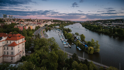 A view of the Vltava River from Prague's Vyšehrad. There is a bay with a harbour on the river. 