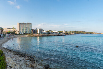 Fototapeta premium The beautiful coast with the turquoise water of the Mediterranean Sea and stunning cliffs of Cala Ratjada on Majorca Island, Spain