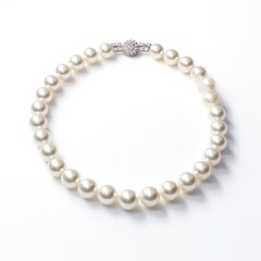 a pearl necklace on a white background