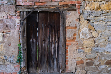 Oxford Old Stone Wall with door, rough sandy texture old medieval stone wall, atmosphere of antiquity and university style Background for design, copy space