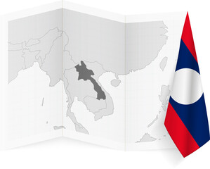 Laos grayscale map and hanging flag.