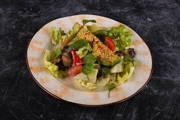 Eggplant, mushroom, tomato and lettuce salad