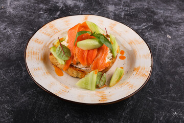 healthy sandwiches with smoked salmon avocado cucumber cream cheese on rye bread