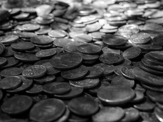 Pile of coins, different European and American metal coins, money background