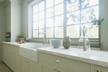 Kitchen sink near a large window, many convenient cabinets with kitchen utensils. 