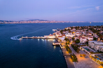 Naklejka na ściany i meble Aerial view of Buyukada (Princes Islands) in Istanbul at sunset. Istanbul, Turkey. Buyukada is the largest of the Princes Islands. Drone shot..