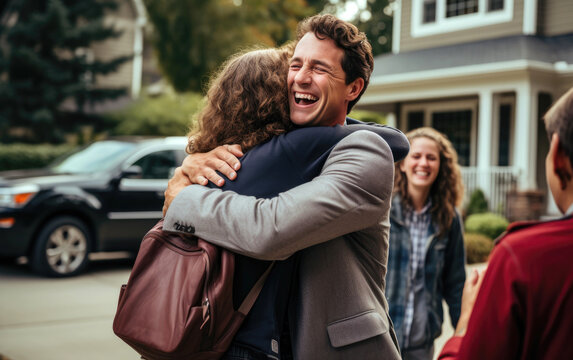 Teenager leaving to a college is hugging parents for goodbye