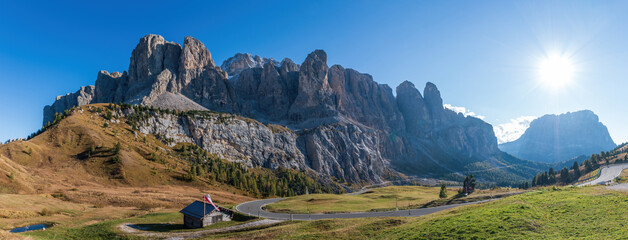 Panoramic view of Gardena Pass with Sella group and Sassolungo - Langkofel mountain group (right),...