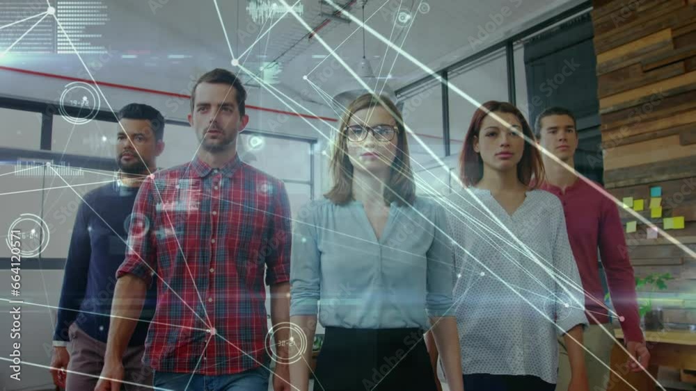 Wall mural Animation of network of connections against group of diverse colleagues walking together at office