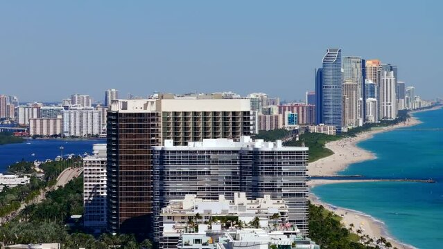 Aerial telephoto drone video Miami Beach Bal Harbour Haulover inlet jetty