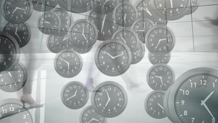 Animation of multiple ticking clocks falling against low section of businesspeople walking at office