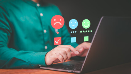 Customer review and feedback with angry emotion face on virtual screen. 