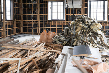 Interior view of building to be demolished and building materials to be discarded