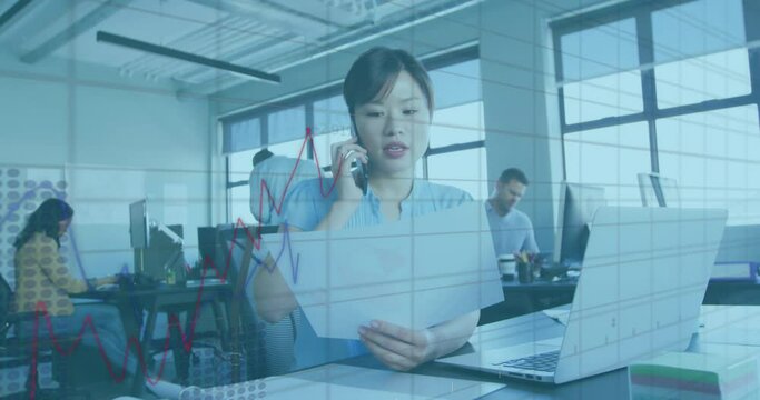 Animation of financial data processing over asian businesswoman in office