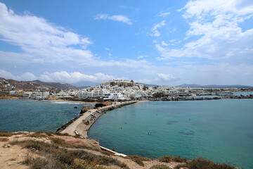 Fototapeta na wymiar The Island of Naxos, Greece as seen from the islet of Palatia across the causeway.