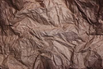 Texture of crumpled parchment paper as background, top view