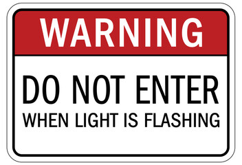 Do not enter when light is flashing sign