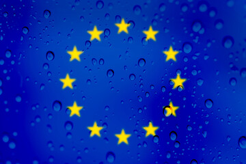 EU flag with rain droplets