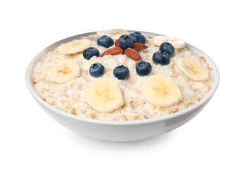 Tasty boiled oatmeal with banana, blueberries and almonds in bowl isolated on white