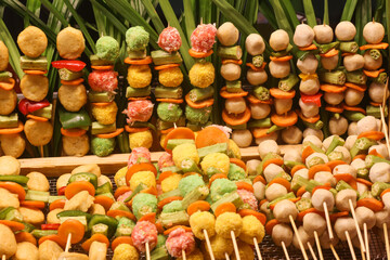 a variety of meatballs beautifully displayed for sale in Vietnamese kios