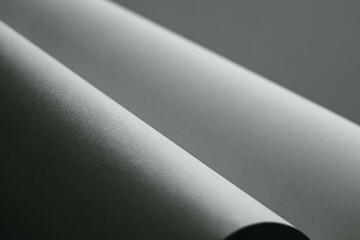 Gently curving paper with strong contrast in black and white