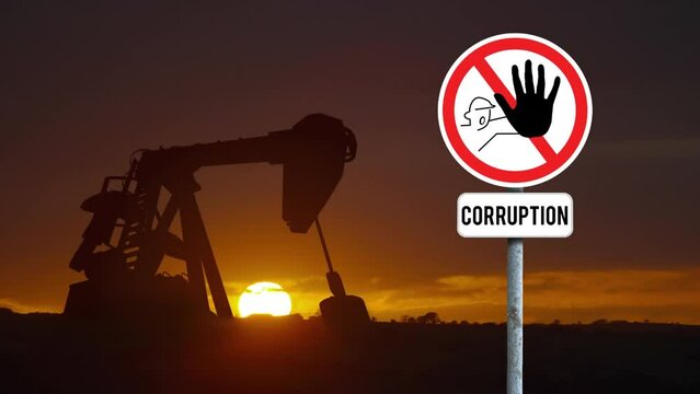 Animation of stop curruption sign board over crane opreating against sunset sky