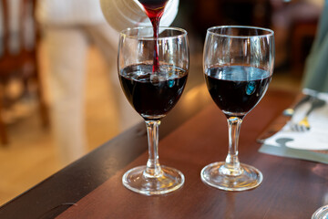 Red dry wine in glasses, lunch with wine in France,  Limouges, France