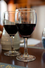 Red dry wine in glasses, lunch with wine in France,  Limouges, France