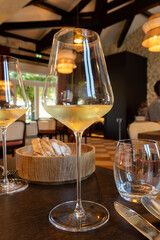 Tasting of Bordeaux white wine in Sauternes, left bank of Gironde Estuary, France. Glasses of white sweet French wine.