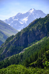 Fototapeta na wymiar Mountains view between La Grave freeride ski village and Col du Lautaret, Massif des Ecrins, Hautes Alpes, France in summer