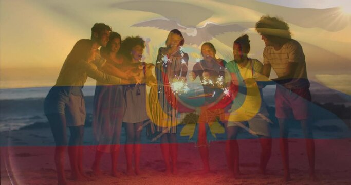 Animation of flag of ecuador waving over diverse friends enjoying at beach with sparklers