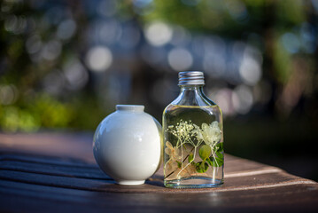 bottle of oil with herbs